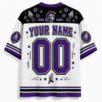 A white and purple short-sleeve jersey with 'YOUR NAME' and '00' printed on the back, decorated with purple stars, arrowhead graphics, and a Spartan helmet motif. The front of the jersey is not shown.