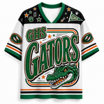 A white V-neck athletic jersey with green and orange accents, featuring 'GHS GATORS' text, a green alligator graphic, stars, paw prints, and shoulder patches on a plain white background.
