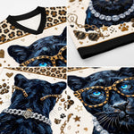 A four-panel close-up collage of a graphic t-shirt featuring a stylized black panther wearing leopard-print sunglasses, a crystal chain necklace, and gold star accents on a cream background.