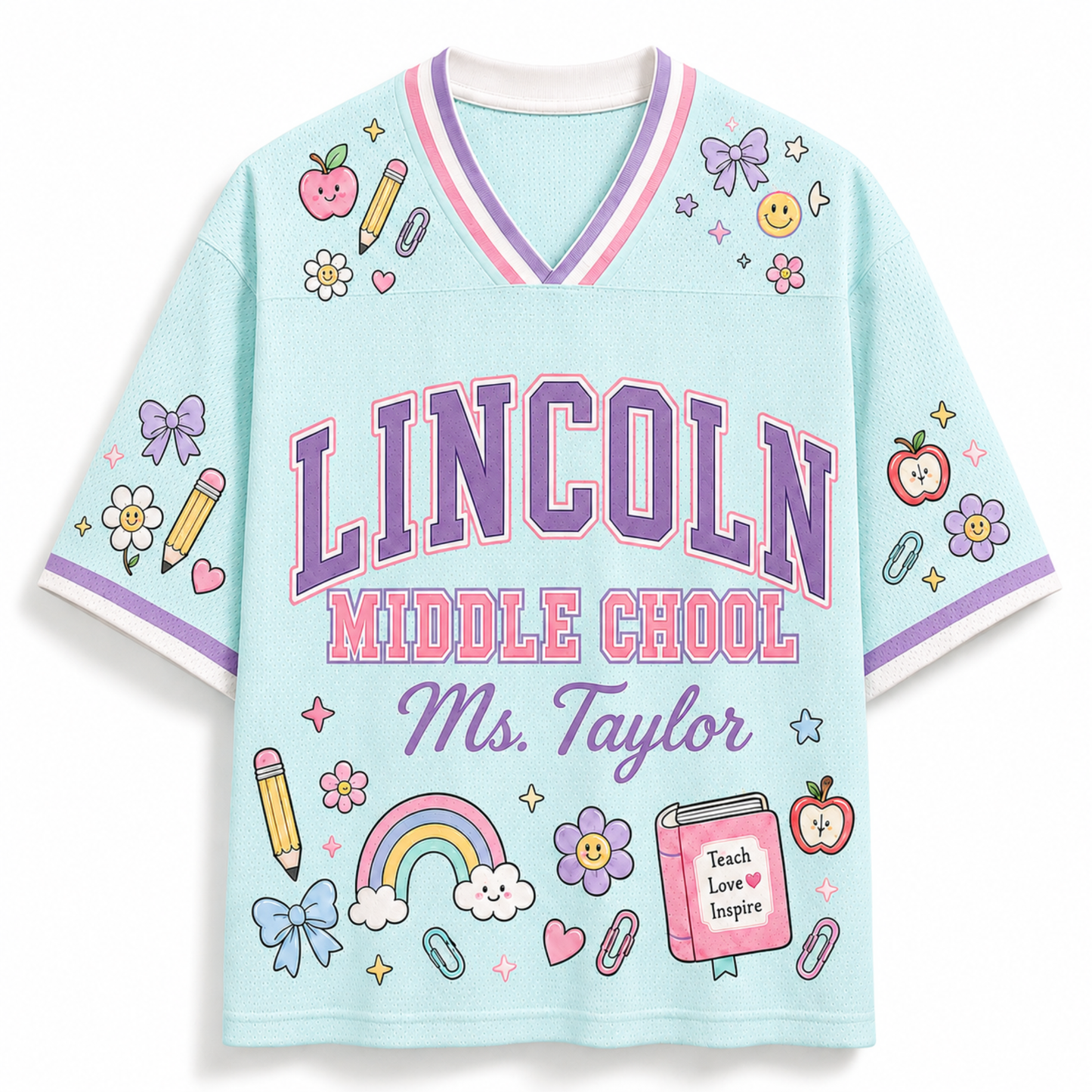 A light blue V-neck short-sleeve t-shirt with 'LINCOLN MIDDLE SCHOOL Ms. Taylor' printed on the front in purple and pink, decorated with school-themed doodles including a rainbow, pencil, flowers, and stars.
