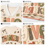 Four-panel product detail collage for a V-neck top. Top-left shows the front neck and neckline; top-right shows a hem detail with decorative lettering; bottom-left shows the back design; bottom-right shows the print texture close-up.