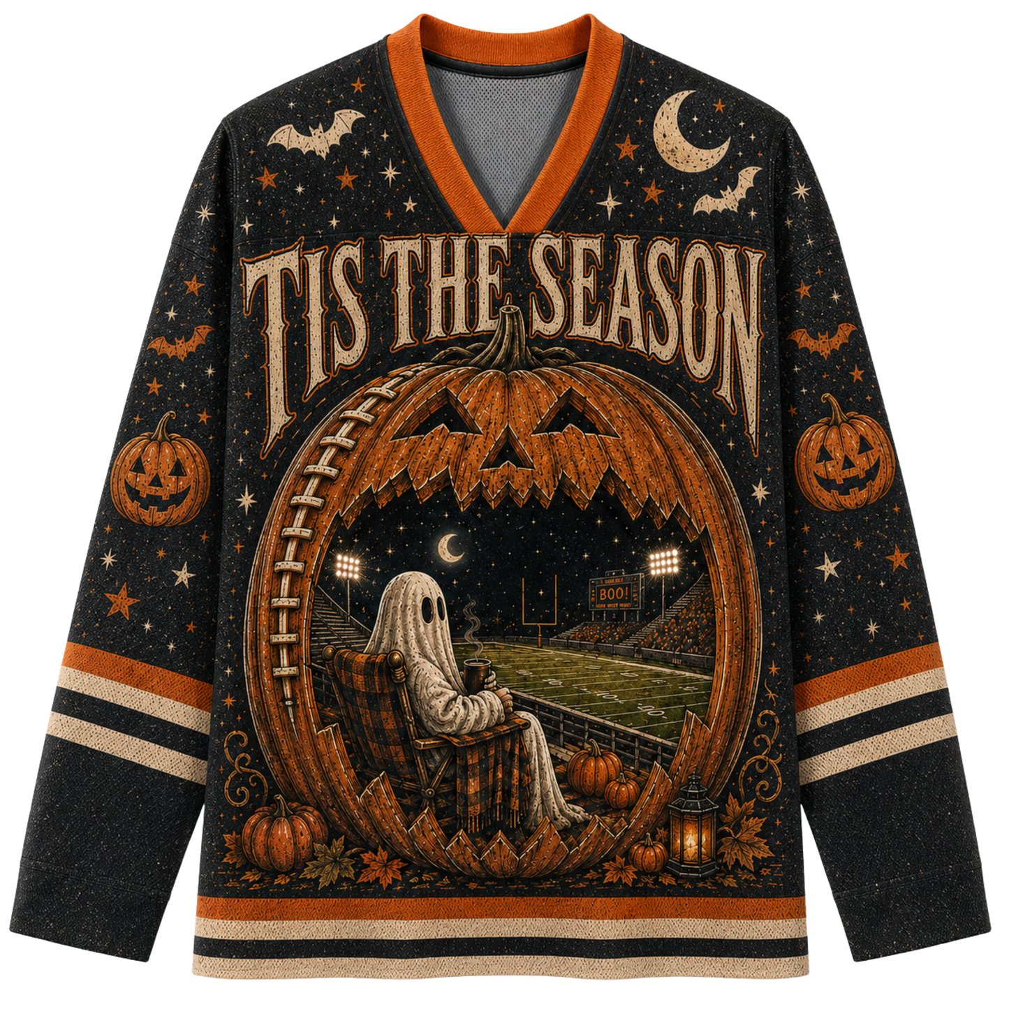 A long-sleeve V-neck sweater with a Halloween theme, featuring a large jack-o'-lantern with a football field and stadium scene inside, a ghost sitting in a chair, pumpkins, bats, stars, and the text 'TIS THE SEASON' on a black background with orange and beige accents.