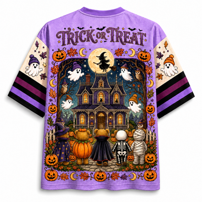 Back view of the Chaotic Club Halloween jersey displaying 'TRICK OR TREAT' text above a full moon witch and teddy bears walking towards a lit haunted home.