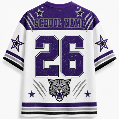 A white and purple sports jersey shown from the back, featuring a large distressed purple number 26, 'SCHOOL NAME' text across the shoulders, star motifs, a wildcat head graphic, and black, gray, and white sleeve stripes.