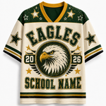 A short-sleeve V-neck jersey-style shirt with a distressed school-eagle theme. The shirt is cream-colored with dark green and gold accents, featuring 'EAGLES' across the chest, a large eagle head graphic, '2026' flanking the eagle, and 'SCHOOL NAME' at the bottom.
