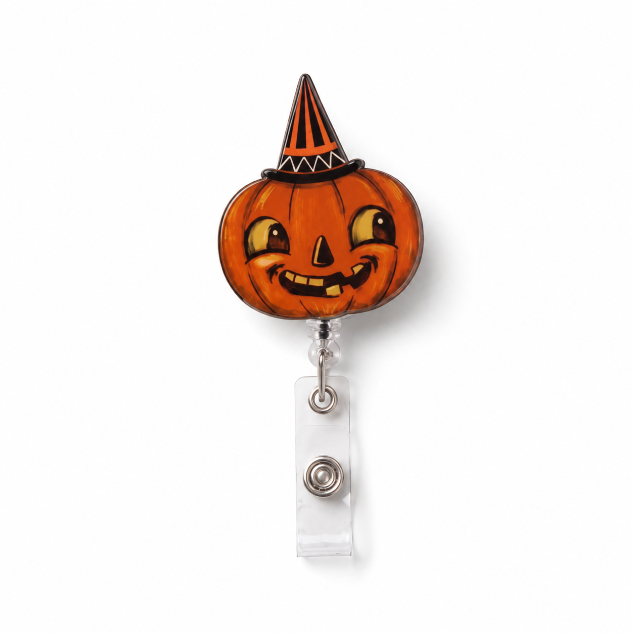 A Halloween-themed retractable badge reel featuring a smiling jack-o'-lantern pumpkin wearing an orange and black witch hat, attached to a clear plastic clip with a silver metal snap button, shown on a plain white background.