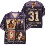 A Halloween-themed short-sleeve V-neck t-shirt shown from both front and back. The shirt features a dark purple base with a collage of vintage postage stamps depicting a haunted house, a jack-o'-lantern, a ghost, and a witch hat, accented with orange-and-white checkered bows, black bats, and gold text reading 'Mopelly of the 31 United House Society' and 'Mentally I Am Here.