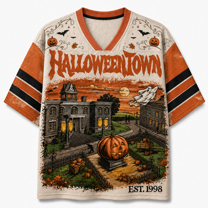 Chaotic Club vintage Halloween town mesh jersey front view showing orange V-neck collar, bold HALLOWEENTOWN typography, town hall, and pumpkin patch.