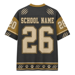 Customizable black and gold sports jersey shown from the back, featuring 'SCHOOL NAME' and the number '26' in beige with gold outlines, complete with paw print and claw graphic details.