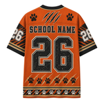 An orange short-sleeve sports jersey shown from the back, featuring a large black number 26 with white and black outlining, 'SCHOOL NAME' text across the upper back, black paw prints, claw marks, and striped sleeve details on a plain white background.