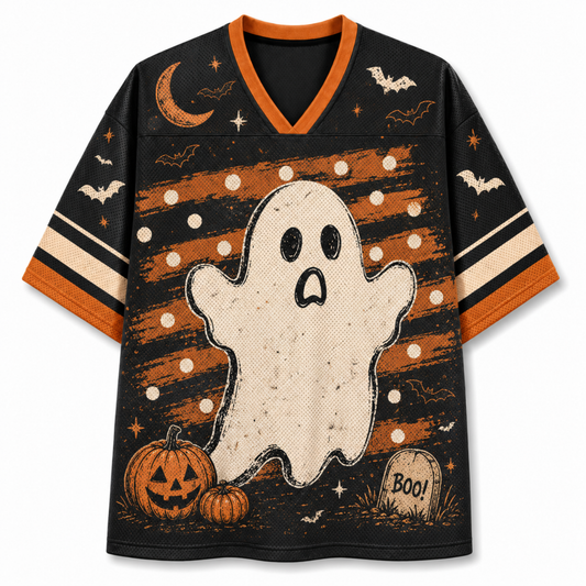 Front view of the black varsity jersey displaying a white vintage ghost over distressed orange brushstrokes, jack-o-lantern pumpkin, crescent moon, and Boo tombstone.