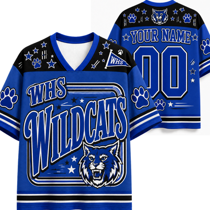 Customizable royal blue and black hockey-style jersey shown from front and back, with 'WHS Wildcats' text, paw prints, star motifs, a wildcat graphic, and placeholder name/number areas on the back.