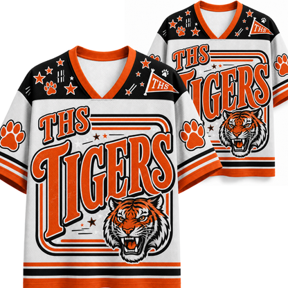 Two views of a custom V-neck athletic jersey featuring 'THS TIGERS' in orange lettering, a roaring tiger graphic, paw prints, and orange and black accents on a white background.