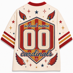 A custom Cardinals school name jersey shown from the back, featuring a cream base with red and gold graphics, including a large '00' in the center, 'school name' and 'cardinals' text, and red cardinal wings.