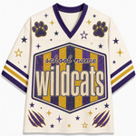 A cream-colored athletic jersey with purple and gold accents, featuring a V-neck, sleeve stripes, paw prints, claw marks, and a central hexagonal patch that reads 'school name Wildcats'.