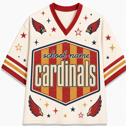 A cream-colored mesh V-neck jersey with red and gold accents, featuring a large central shield graphic that reads 'school name cardinals' and decorative cardinal wings and stars.