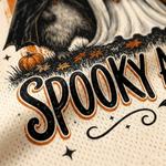 Macro close-up shot of the graphic print on mesh fabric, focusing on the high-definition vintage textures of the witch raccoon fur, plaid bow sheet ghost, and orange polka dot stripes.