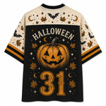 A short-sleeve athletic-style shirt shown from the back, featuring a black center panel with a large carved pumpkin, the word HALLOWEEN, and the number 31 in orange, surrounded by stars, moons, leaves, and bats. The sleeves and upper back are cream with matching Halloween motifs and orange stripe accents.