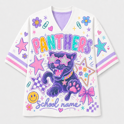 A white V-neck t-shirt with a colorful graphic print featuring a purple panther, pink bows, stars, and the text 'PANTHERS' and 'School name'.