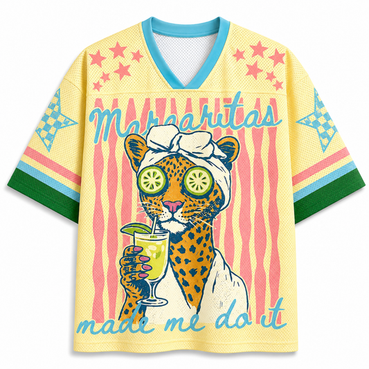 Front view of the yellow "Margaritas made me do it" jersey with a graphic of a leopard wearing a spa towel and cucumber eye masks, designed for a relaxed streetwear fit.