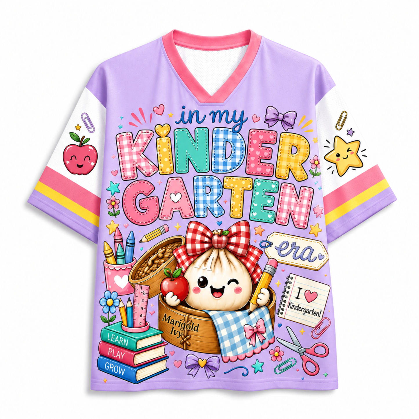 A lavender short-sleeve V-neck t-shirt with a colorful cartoon graphic on the front reading 'in my KINDER GARTEN era'. The design features a cute girl with a red-and-white checkered bow, a basket, books, scissors, and other school-themed illustrations.