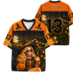 ChaoticClub Halloween witch sports jersey back view highlighting customizable YOUR NAME text, a large orange-outlined black number 13, and spooky pumpkin patch background.