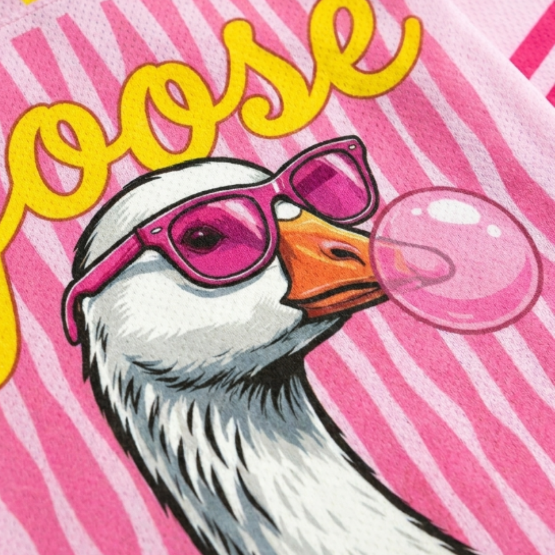 Detailed close-up of the goose wearing pink sunglasses and blowing bubblegum on the ChaoticClub summer jersey, showing the vibrant colors and sharp print quality.