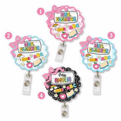 Set of four colorful badge holders with 'Mrs. Eleanor' and 'Mrs. Amelia' text on a white background.
