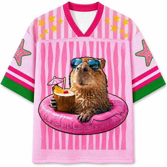ChaoticClub pink striped summer mesh jersey featuring a cool capybara wearing sunglasses, lounging in a pink floatie and holding a coconut drink, designed in a bold oversized streetwear fit.