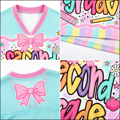 Collage of pastel-colored clothing with bows and colorful text, resembling a children's outfit design.