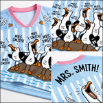 Children's pajama set with cartoon pelican design and 'Mrs. Smith!' text.