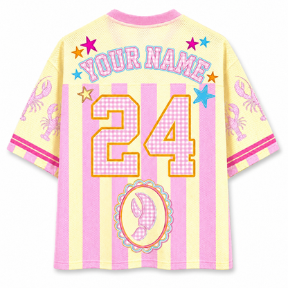 Colorful sports jersey with stars, numbers, and lobster designs on a white background