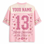 ChaoticClub pink glam ghost mesh jersey front view showing a V-neck collar, pink bow print, and a glam ghost graphic with "Too Cute to Haunt" text.