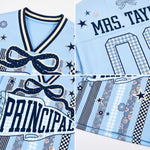 Detailed close up of ChaoticClub Principal jersey print showing the textured navy blue PRINCIPAL typography, sparkling stars, and fabric weave.