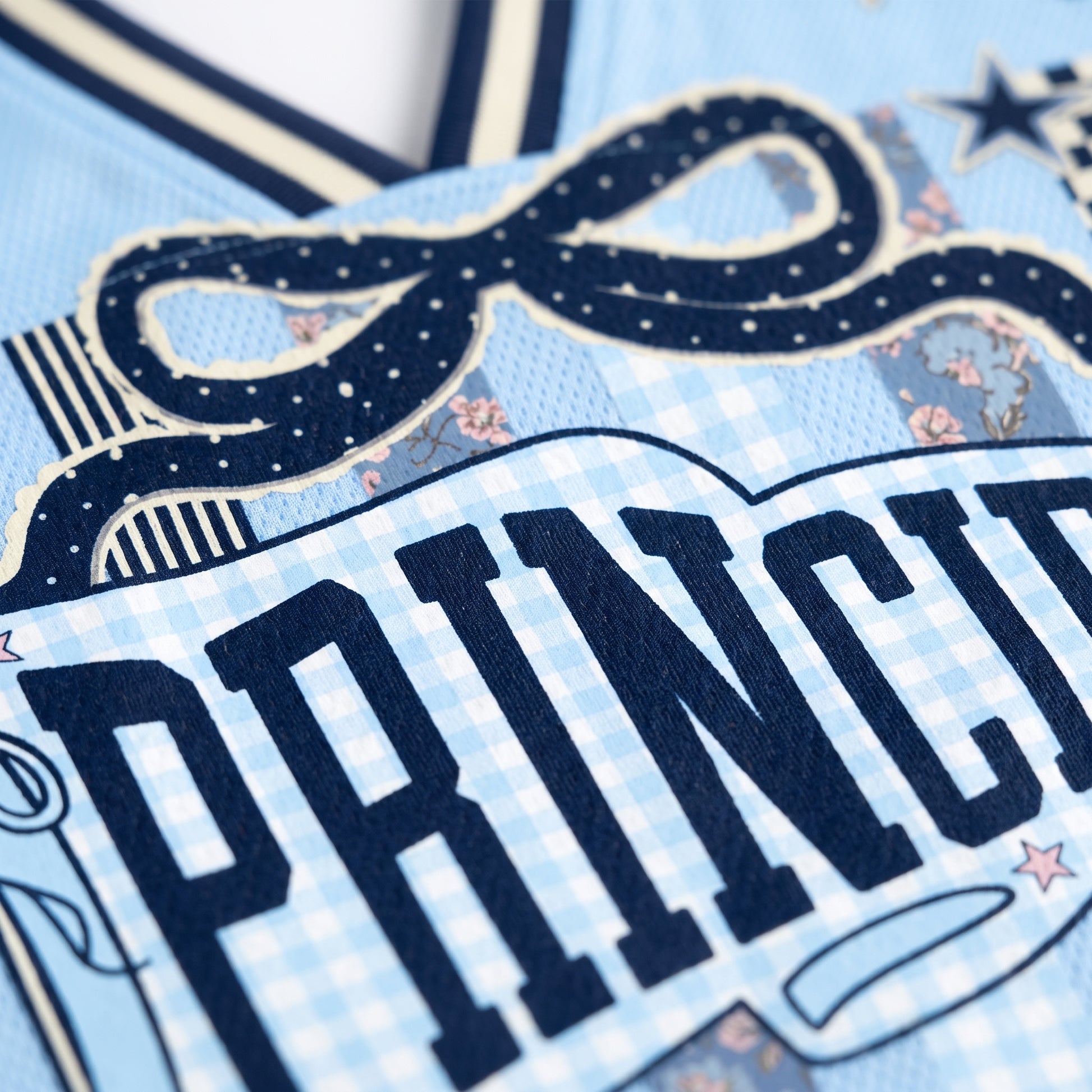 Close-up of a decorative item with 'PRINCESS' text on a blue background