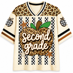A short-sleeve V-neck t-shirt with a graphic design. The shirt features a leopard print pattern on the shoulders and sleeves, black and white checkered stripes on the front, and a large central apple graphic filled with leopard print and the words 'Second grade' in white script.
