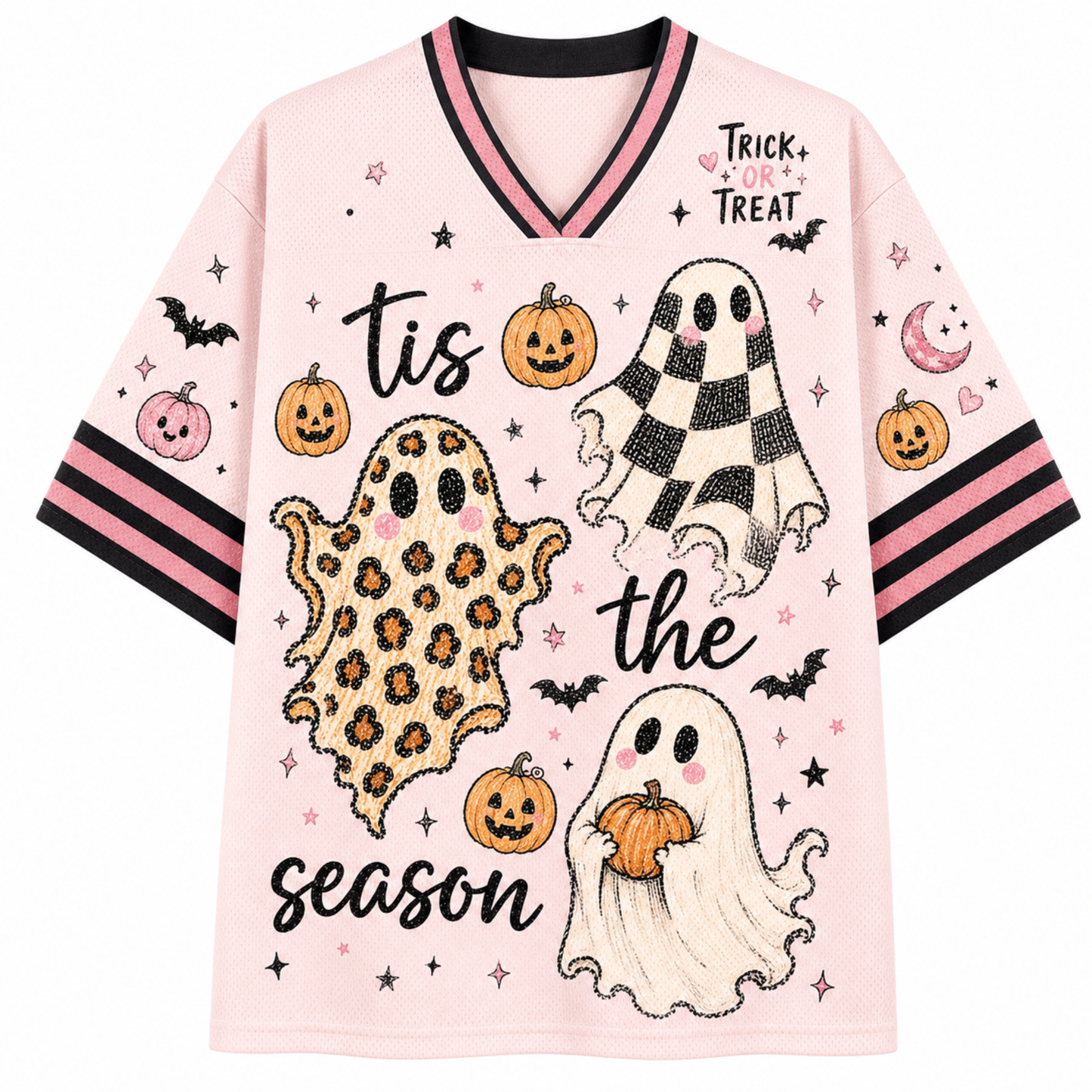 A light pink short-sleeve V-neck T-shirt with Halloween graphics, including three ghost illustrations (one leopard print, one black and white checkered, one plain white), pumpkins, bats, stars, and the text 'tis the season' and 'TRICK or TREAT'.