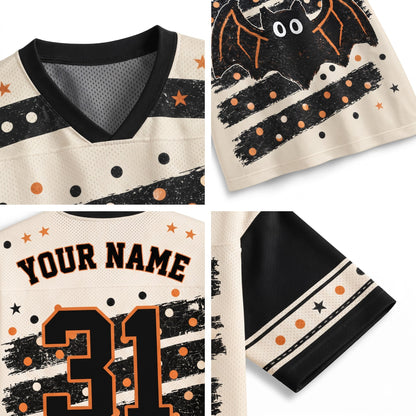 Halloween-themed sports jersey shown in a four-panel detail layout. The cream mesh jersey features a black V-neck collar, black and orange distressed stripes with orange stars and dots, a black bat graphic with white eyes on the sleeve, 'YOUR NAME' text, and the number '31' on the back.