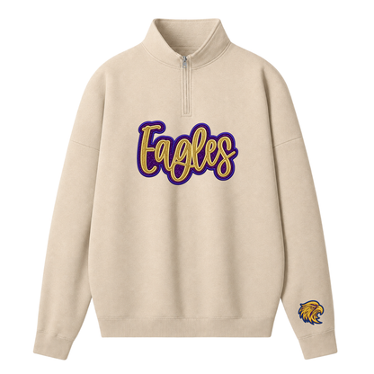 Custom Embroidered Eagles Glitter Quarter-Zip Sweatshirt in beige featuring gold glitter cursive text with purple outline and sleeve eagle mascot logo.