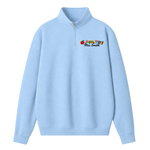 A light blue quarter-zip sweatshirt with a small colorful 'Mrs. Smith' graphic on the left chest, displayed on a clean white background.