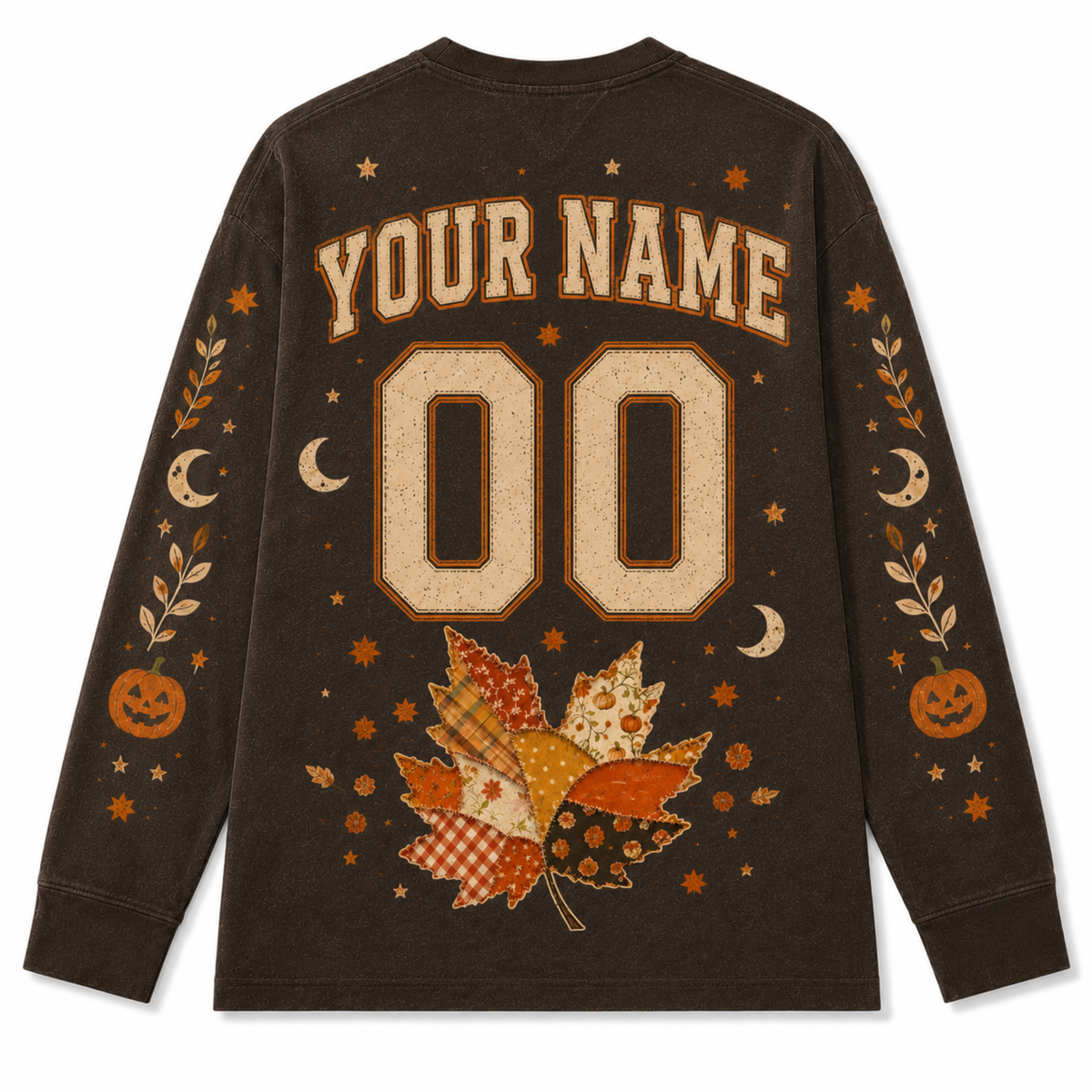 A dark brown long-sleeve t-shirt with a custom Halloween-themed graphic on the back. The design features a customizable name and number '00' in a distressed beige font, surrounded by autumn leaves, pumpkins, stars, and crescent moons in orange, beige, and brown tones.