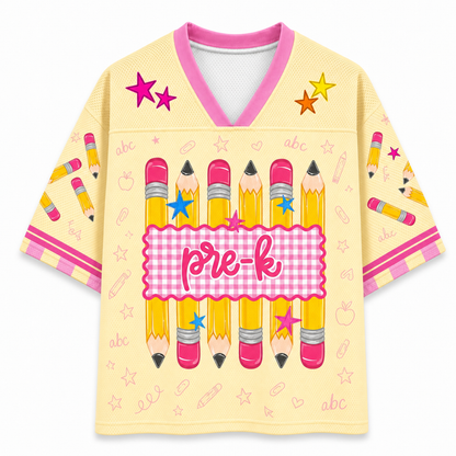 Yellow shirt with pink accents and 'pre-k' design on a white background
