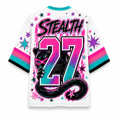 White mesh short-sleeve jersey with a colorful graphic print on the back. The design features the word 'STEALTH' in black and pink, the number '27' in a pink-to-turquoise gradient, a black cat with a pink mask, and pink, teal, and black starburst accents.