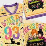 A four-panel collage showing a yellow and purple V-neck t-shirt with Halloween-themed graphics. The graphics include 'HOCUS POCUS' in colorful letters, a black cauldron with 'EST.
