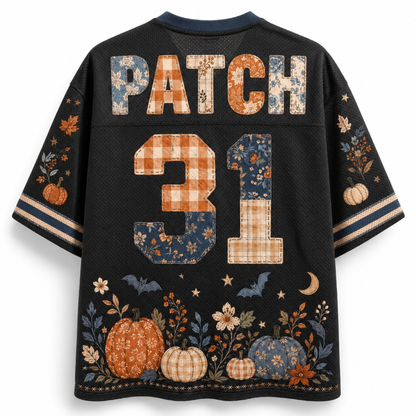 A black mesh short-sleeve jersey shown from the back, featuring the name 'PATCH' and number '31' in a patchwork autumn pattern. The bottom is decorated with a patchwork pumpkin and floral design, and the sleeves have matching patterned details.